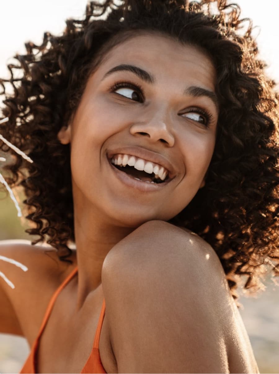 adult woman smiling with straight teeth